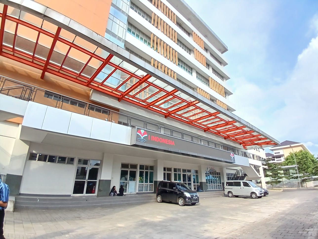 UPI campus building in Bandung with red steel canopy